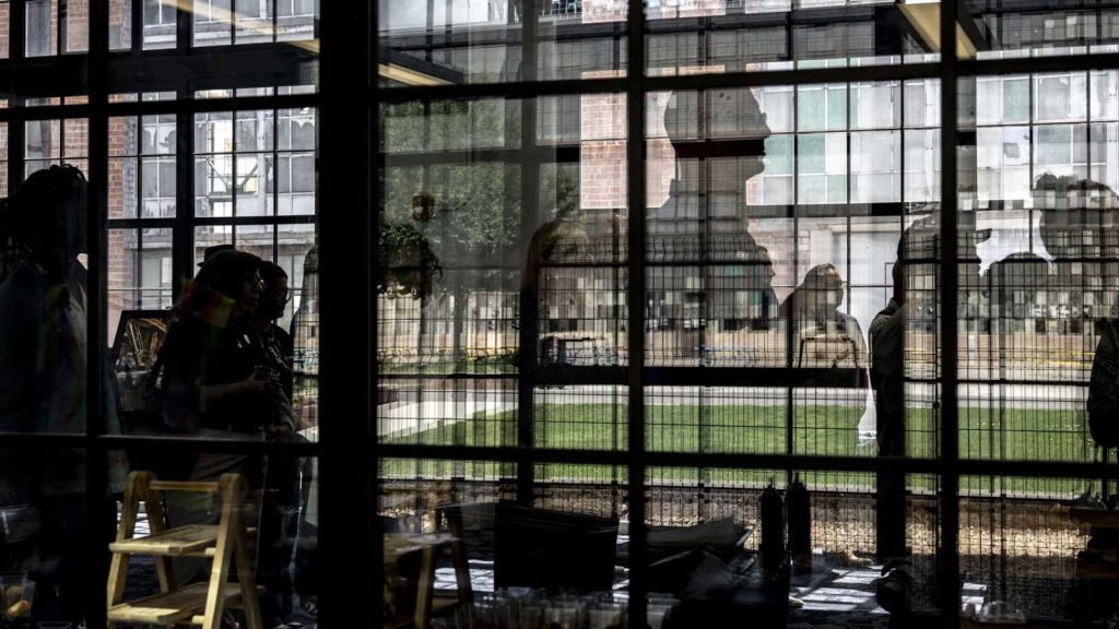Photo of a reflection of someone at the railyards